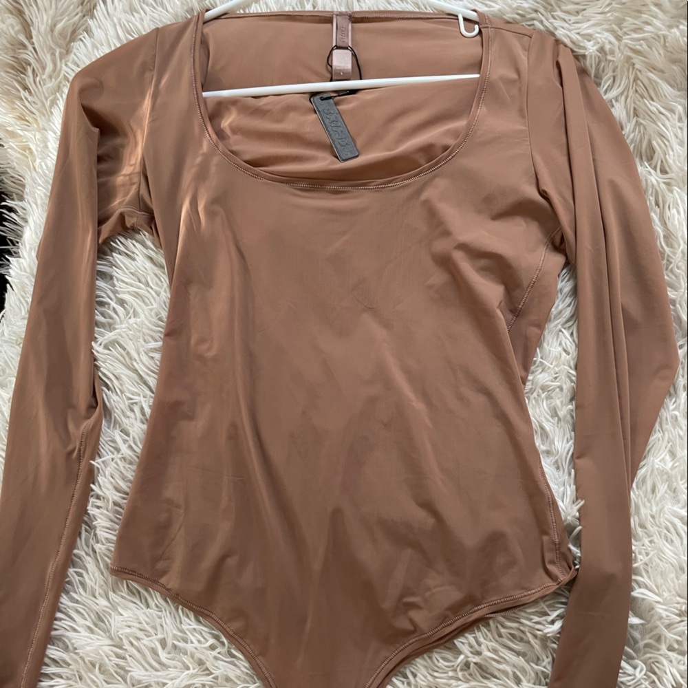 Skims body suit